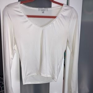 White long sleeve top